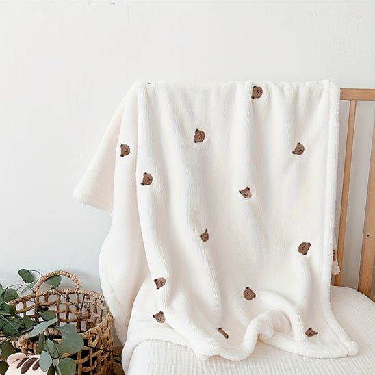 couverture bébé sur chaise avec fleur ourson