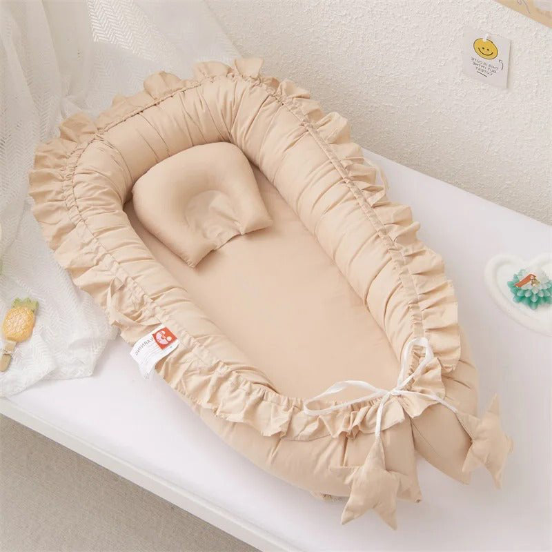 nid de bebe beige nomade avec coussin douillet beige