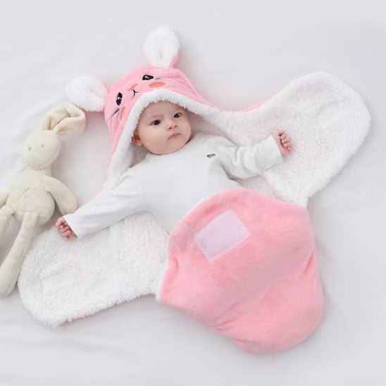 avec bras ouvert dans nid d'ange bebe confo rosy
