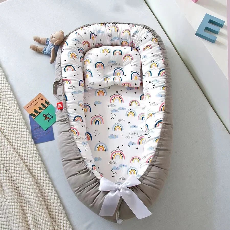 berceau bébé cocon douillet nidportablebebe arc-en-ciel