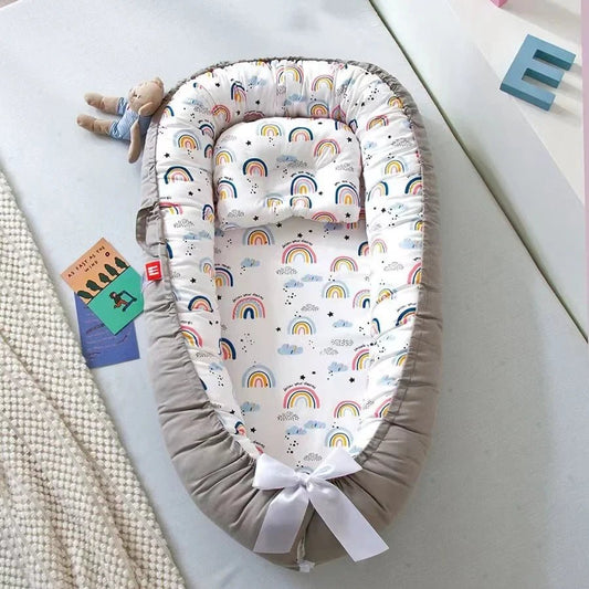 berceau bébé cocon douillet nidportablebebe arc-en-ciel