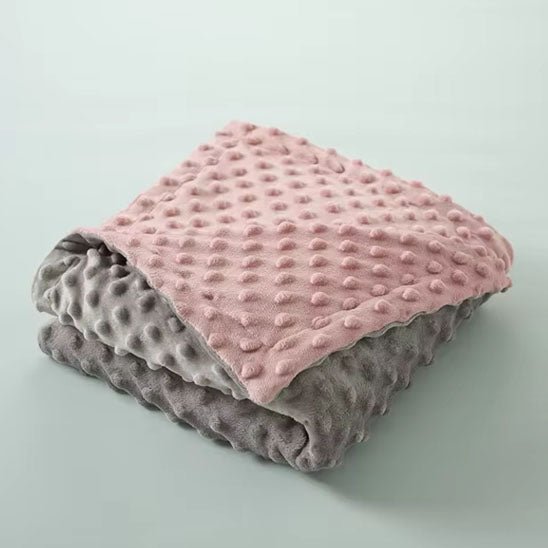 couverture bébé réversible rose plié réversible