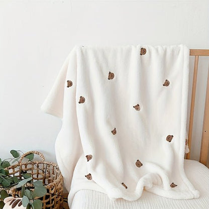 couverture bébé sur chaise avec fleur ourson