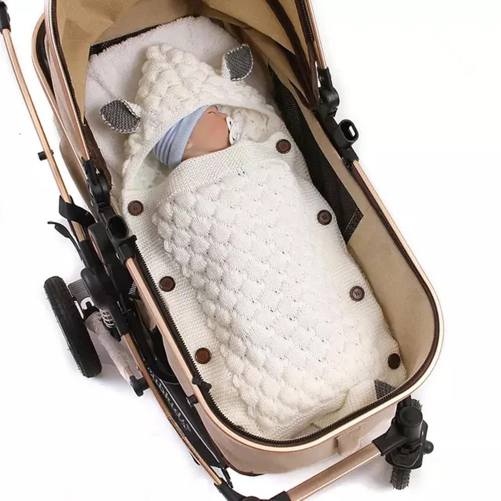 nid d'ange poussette blanc avec bebe confortable bebe renard