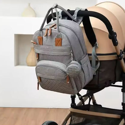 sac à dos à langer avec attache poussette gris